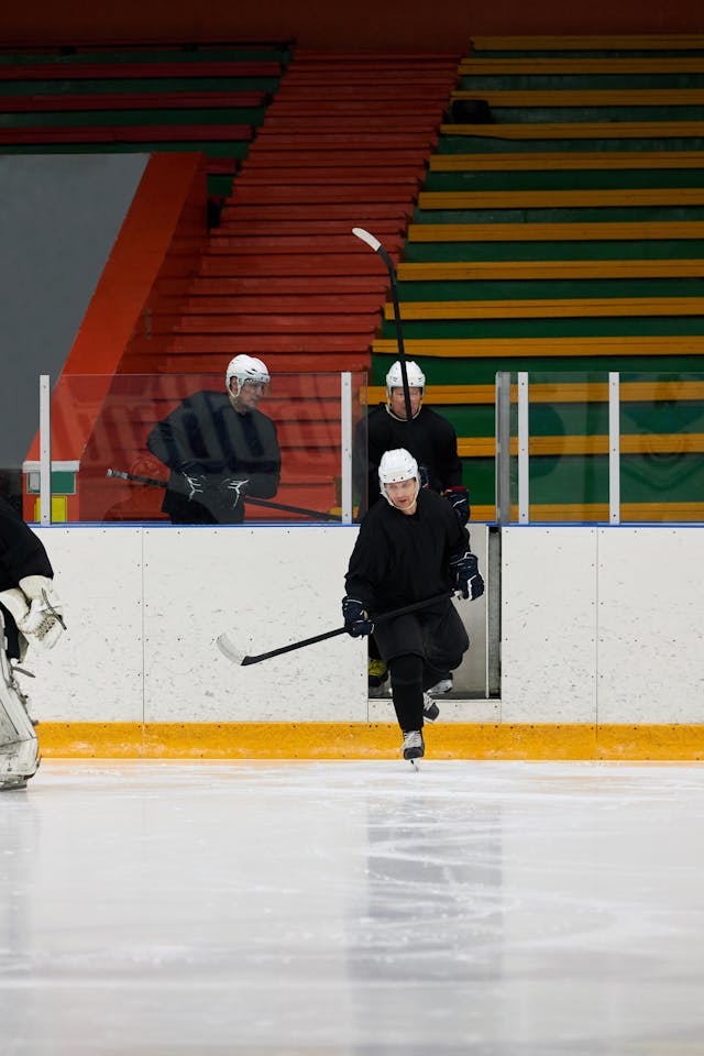 Hockey players entering rink