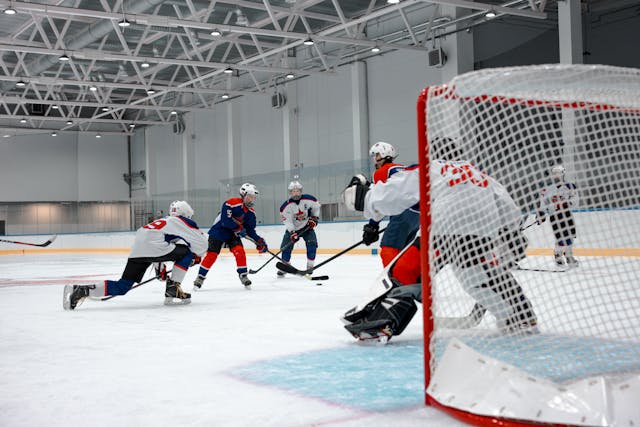 Ice hockey game action