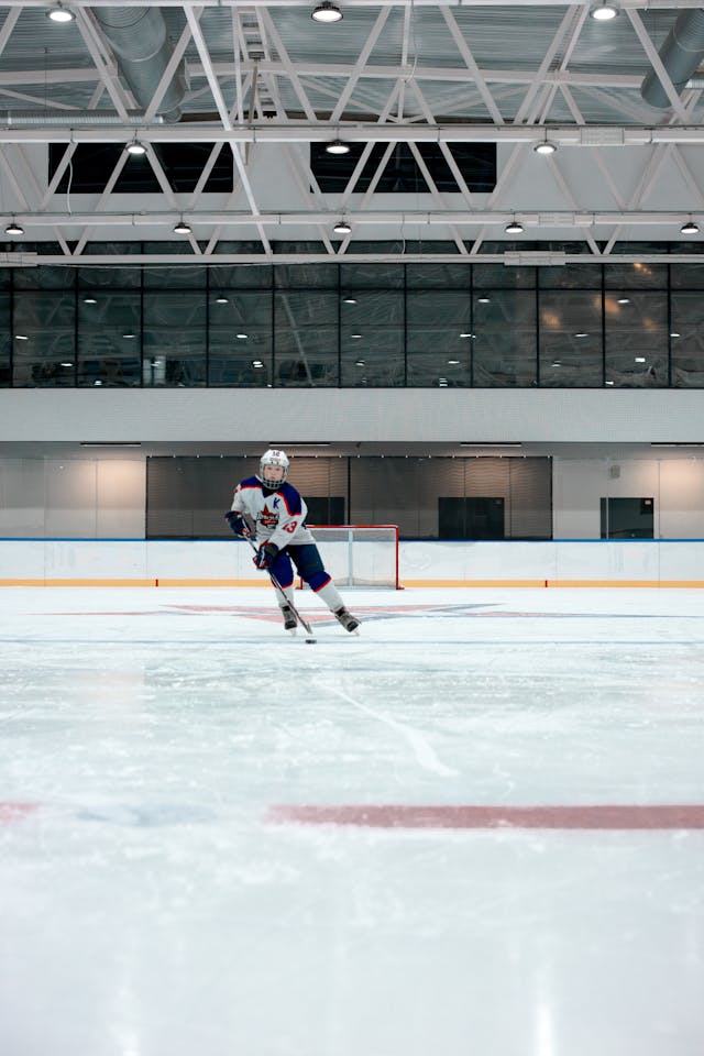 Hockey player skating on ice