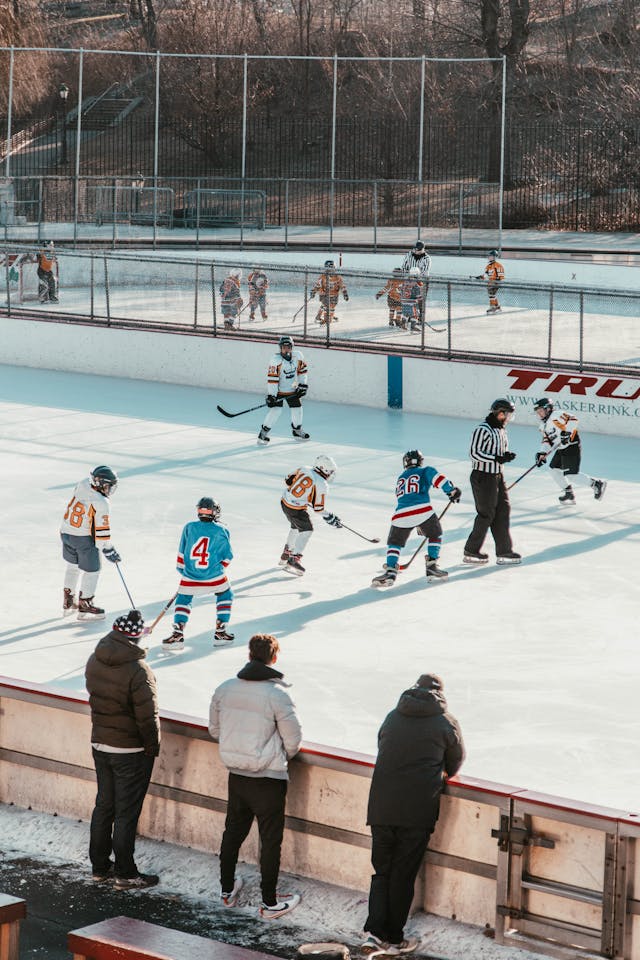 Players playing ice hockey