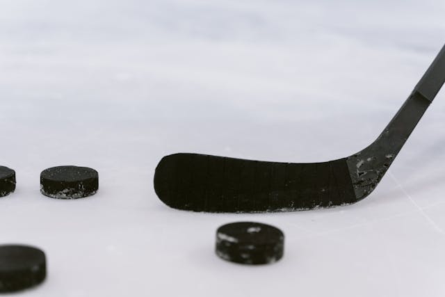 Hockey stick and puck close-up